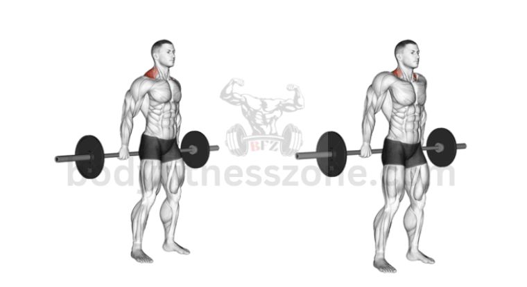 A man performing behind the back shrugs with a barbell, focusing on trap engagement