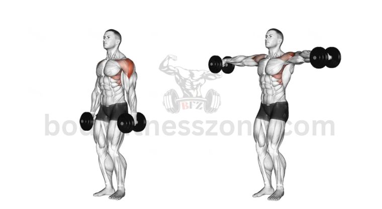 A man performing dumbbell lateral raises during his shoulder workouts
